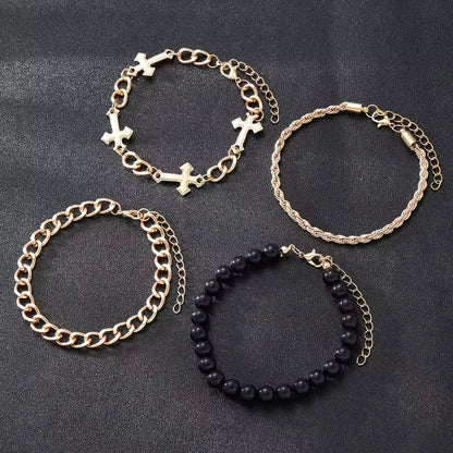 Set van 4 gouden punkarmbanden met minimalistisch kruis en zwarte kralen – stijlvolle kettingarmband geïnspireerd door Justin Bieber